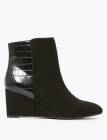 https://www.marksandspencer.com/wide-fit-wedge-pointed-ankle-boots/p/c